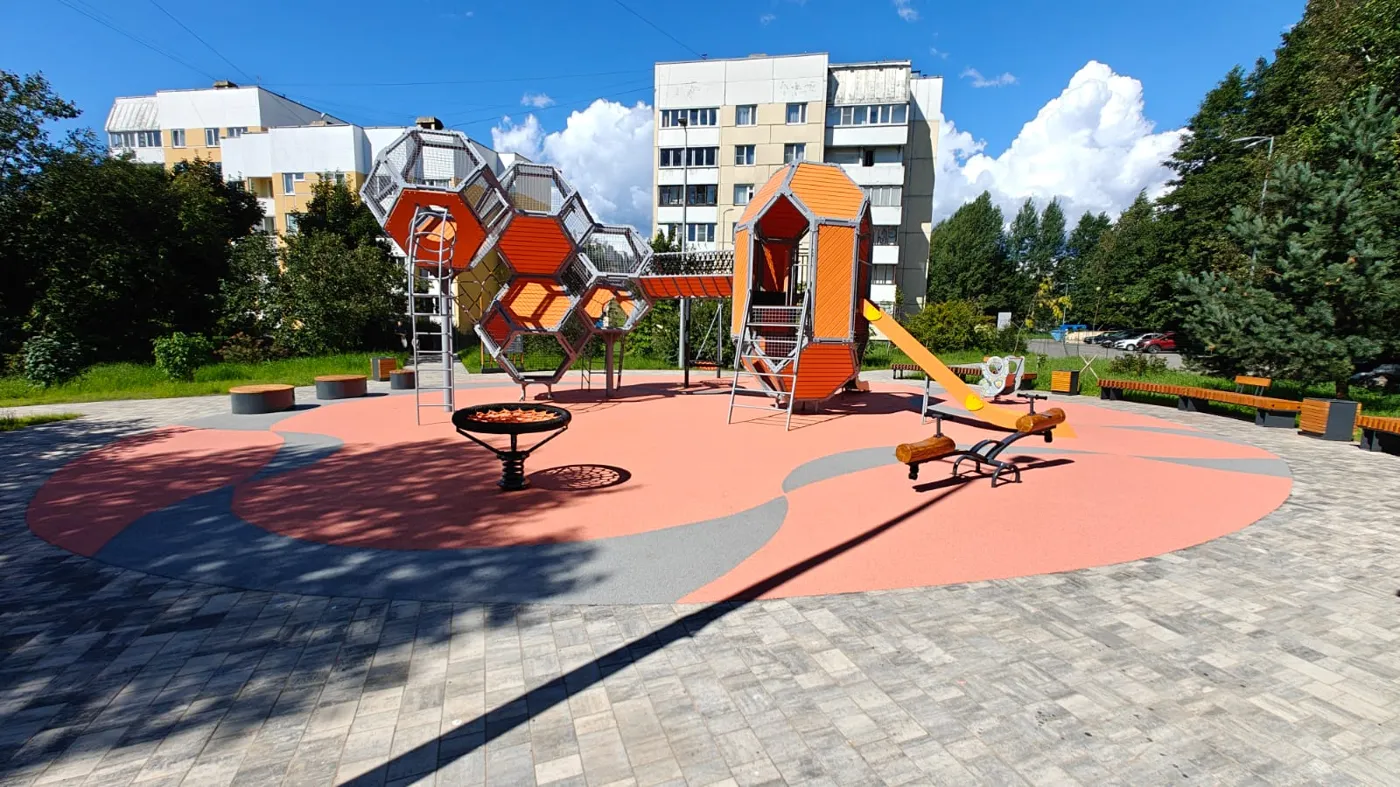 Playground with a terracotta and grey EPDM surface
