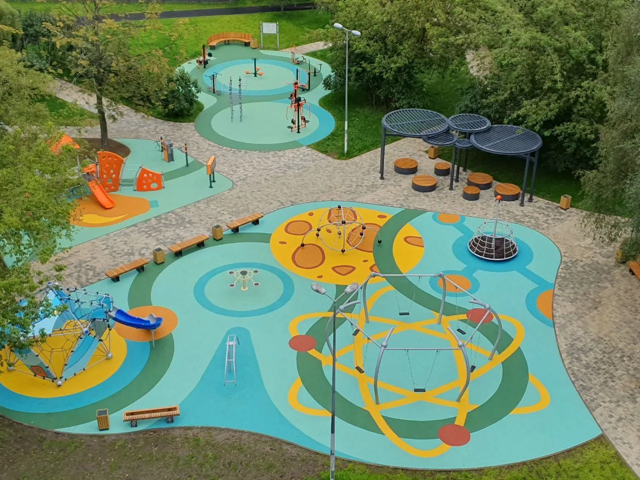 Aerial view of a playground with a patterned EPDM surface